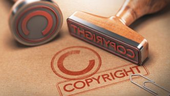 Copyright stamp and paperclip on document