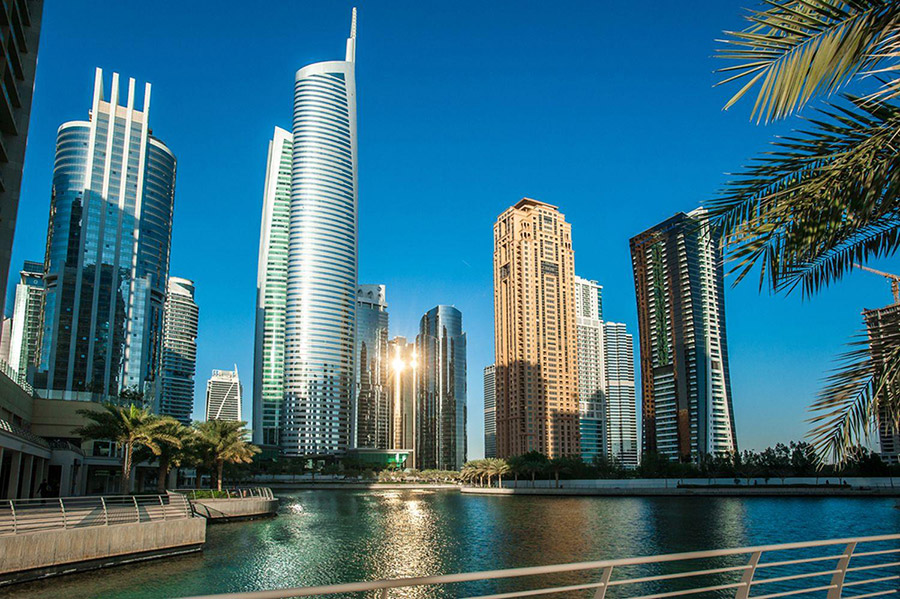 Skyline of modern Dubai city with waterfront